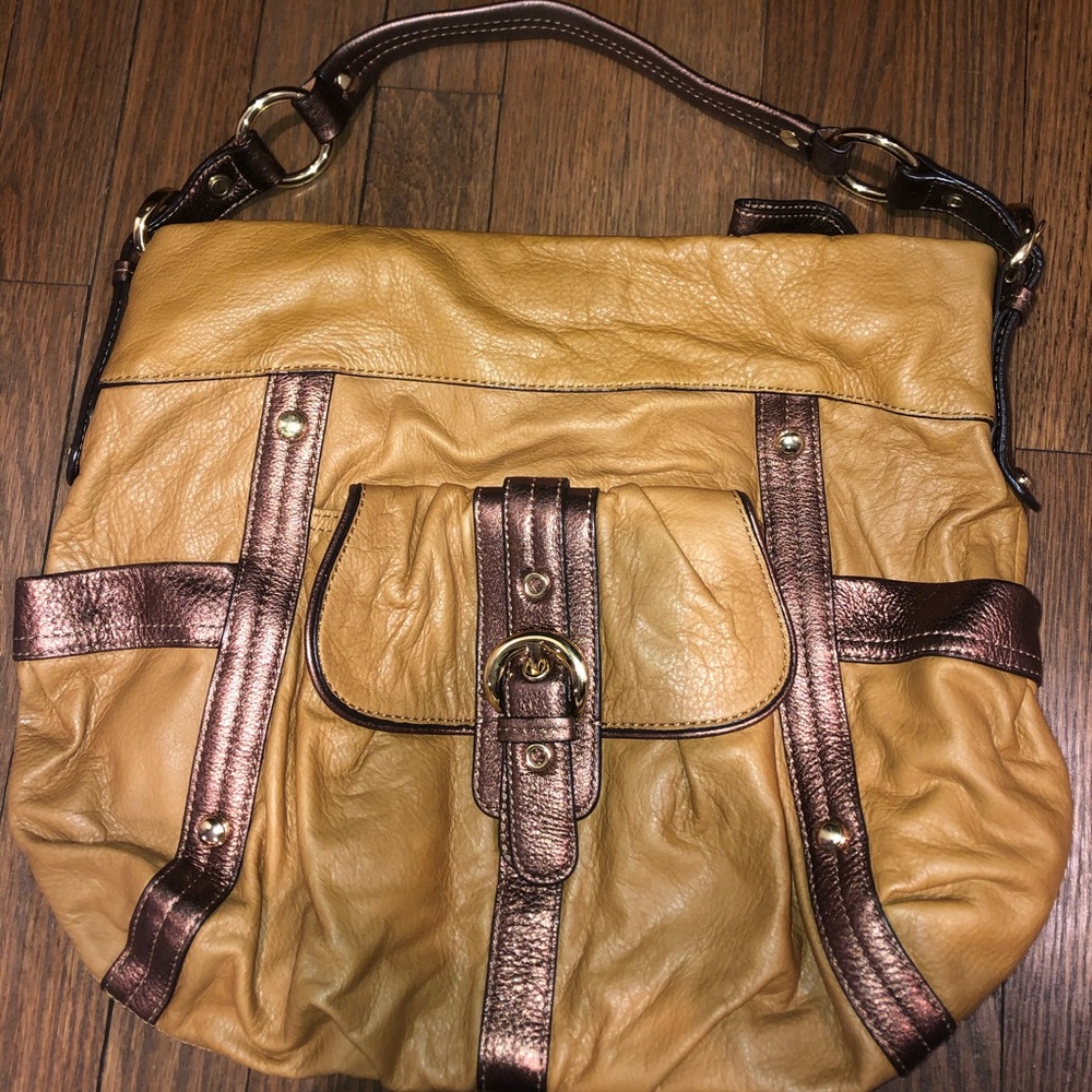 B. Makowsky gold and yellow pocketbook